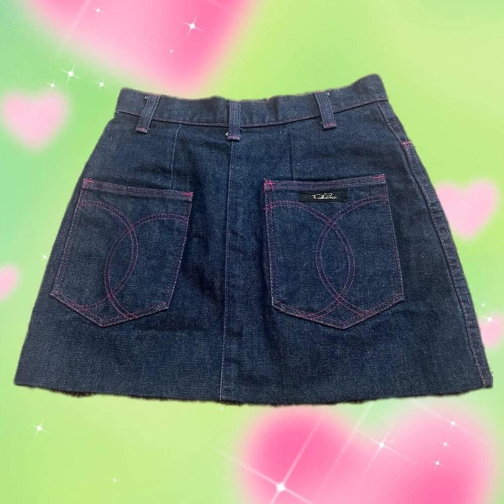Vintage Emilio Pucci denim high waist mini skirt with pink stitching.